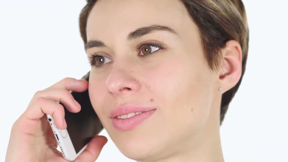 Close Up of Woman Talking on Smartphone with Customer