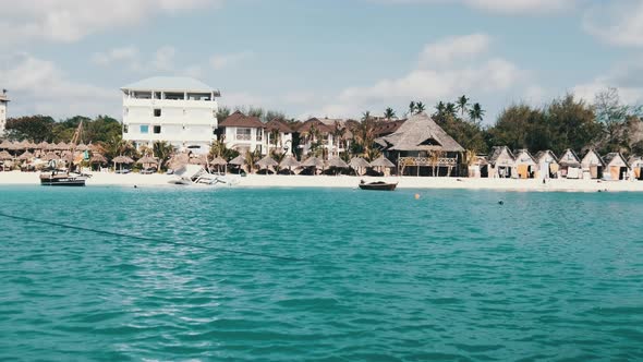 Zanzibar Coastline with Sandy Beach Palms and Hotels