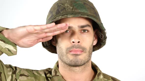 Soldier saluting on white background