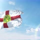 Flag of Alderney waving in the wind with blue Sky - VideoHive Item for Sale