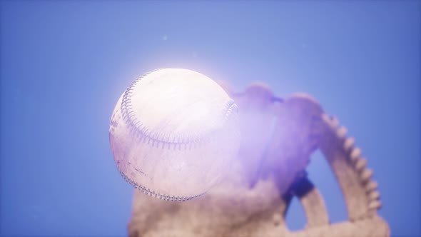 Baseball and Mitt at Blue Sky Background alt
