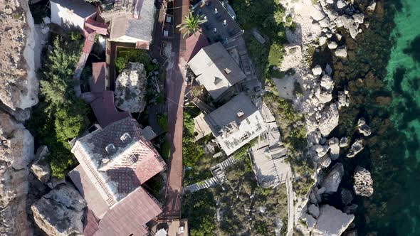 Popeye village theme fun park in Malta,sunny,overhead aerial view.