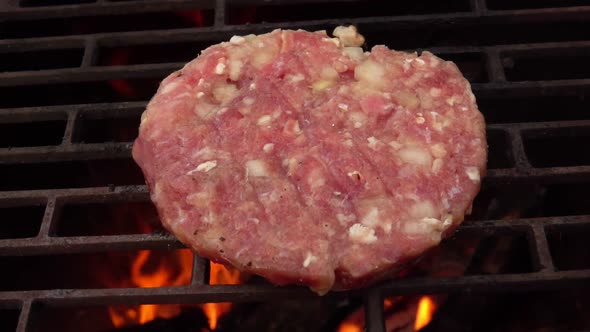 Closeup View of the Homemade Burger Cutlet Frying on the Grill