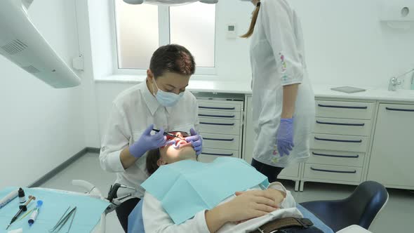 Dentist treating a patient