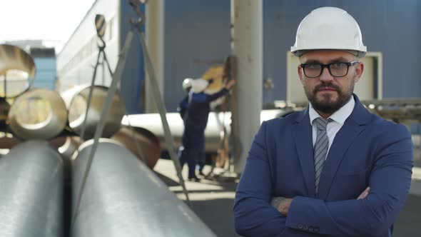  Engineer in Suit and Hard Hat in Industrial Workplace