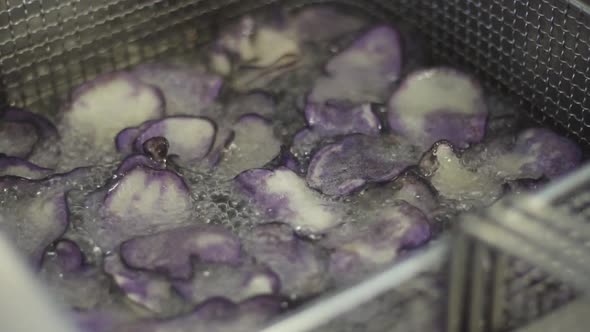 Purple Fried Potatoes Fry in Oil