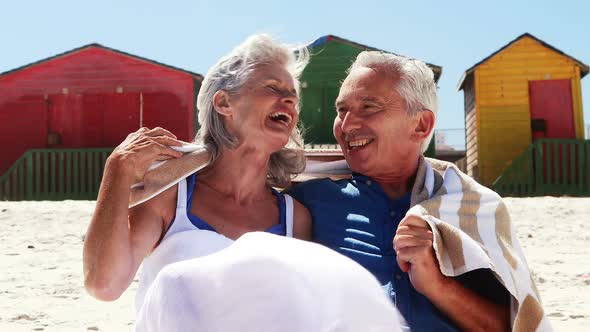 Senior couple enjoying together at the beach