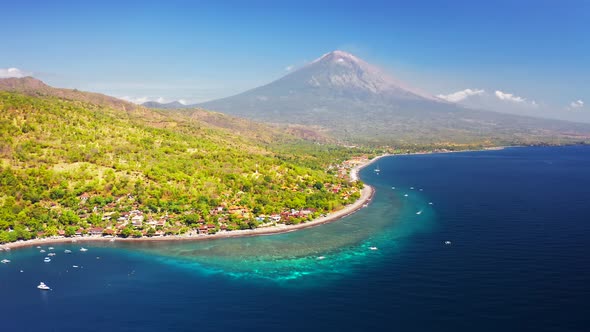 Panoramic View of the Jemeluk Bay, Amed Village, the Agung Volcano Mountains and the Azure Sea in