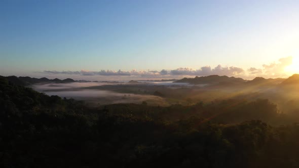 Foggy Jungle Sunrise Mountains Aerial Drone Shot