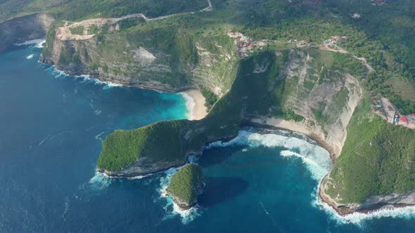 Aerial View of Kelingking Beach in Nusa Penida Island Beautiful Ocean Mountains