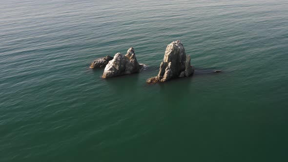 Drone View of the Sharp Cliffs in the Sea