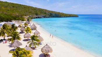 Curacao, Playa Cas Abao in Curacao Caribbean tropical white beach with a blue turqouse colored ocean. Drone aerial view at the beach summer holiday