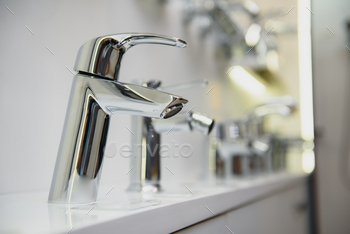 Water faucet, bathroom faucet and kitchen faucet. Chrome-plated metal.