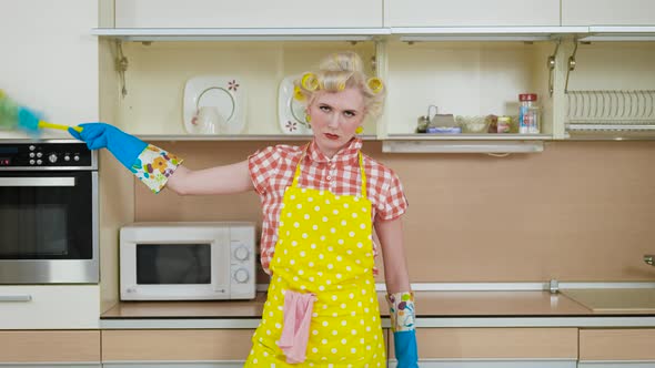 The Tortured Housewife Is Cleaning the Kitchen