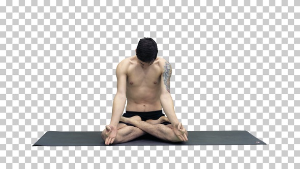 Young man practicing yoga in lotus position, Alpha Channel