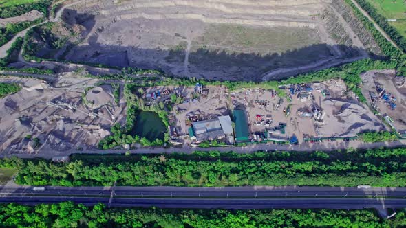 Opencast Granite Mining Quarry with Working Machinery