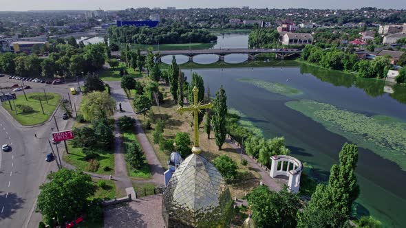 Skyline of Small Town River and Bridge