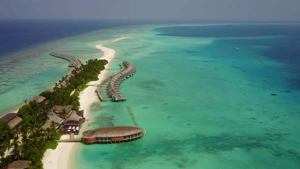 Drone scenery of island beach by lagoon with sand background