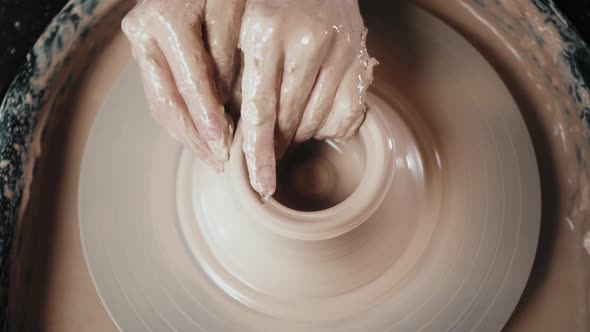Close Up of Potter Clay Wheel Pottery Workshop Woman Making Diy Pot to Sale in Ecommerce Store Home