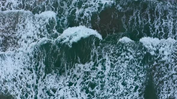 approaching sea waves from a bird's eye view