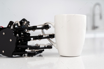 Real robot hand  and white cup of coffee. Concept of  robotic process automation