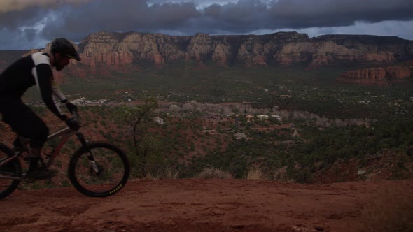 Mountain biker in arizona mountains crossing screen