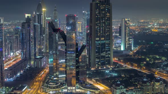 Dubai International Financial Centre District with Modern Skyscrapers Night Timelapse