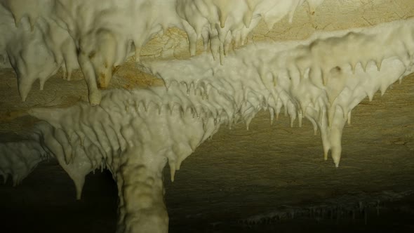 Deep inside  underground  cavern 3840X2160 UltraHD tilting  footage - Beautiful   cave formations of