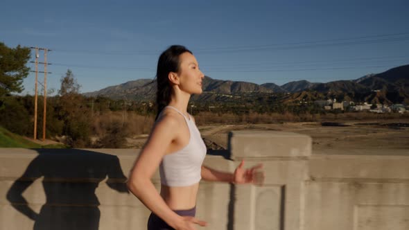 Attractive asian woman going for her morning run