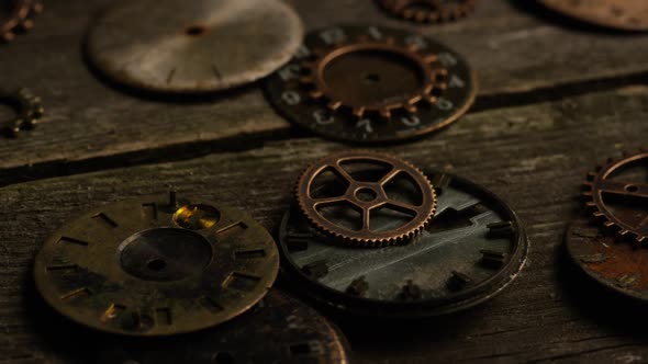 Rotating stock footage shot of antique and weathered watch faces - WATCH FACES 089