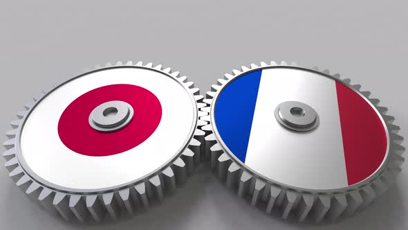 Flags of Japan and France on Meshing Gears