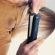Vertical Video Woman Straightens Her Hair - VideoHive Item for Sale
