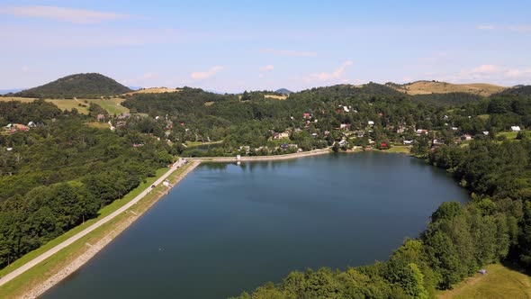 Aerial view of Vindsachtske lake in the village of Stiavnicke Bane in Slovakia