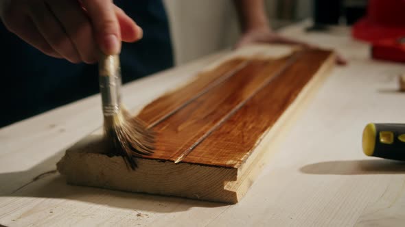 Varnishing Wooden Board Closeup