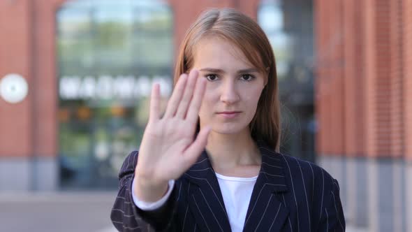 Not Allowed, Gesture of Stop by Businesswoman Standing Outside