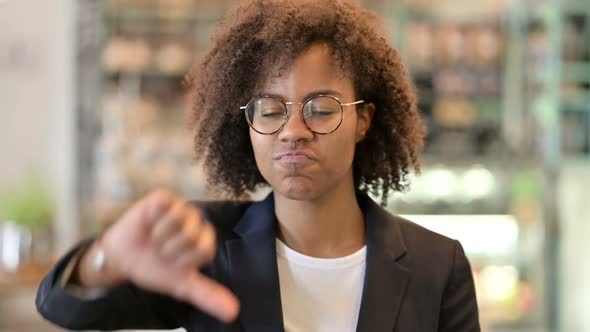 Disappointed African Businesswoman Doing Thumbs Down