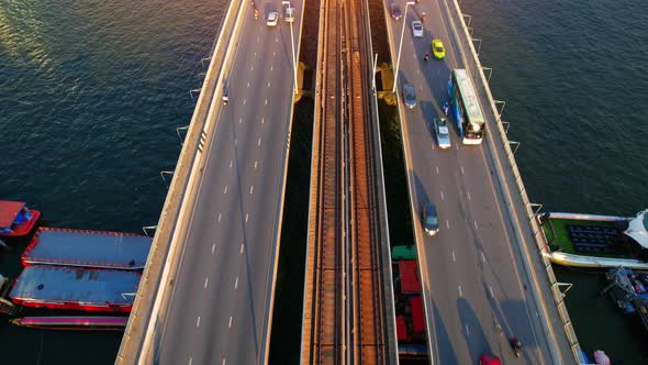 4K : Drones fly over the Chao Phraya River. Aerial view over bts skytrain