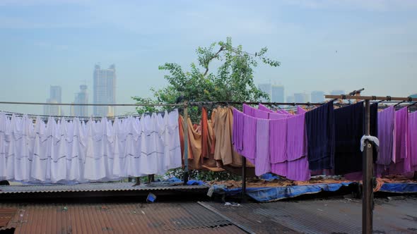 Dhobi Ghat - Huge Open Air Laundy with Modern Buildings on Background. Mumbai, Maharashtra, India