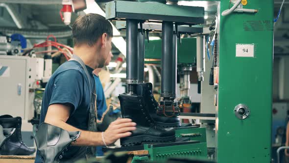 Footwear Factory with Male Workers Manufacturing Shoes