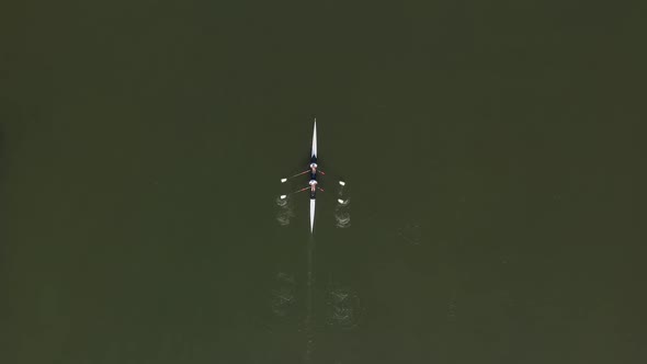 Two seat Sport Kayaks rowing on tranquil river water, Aerial view.