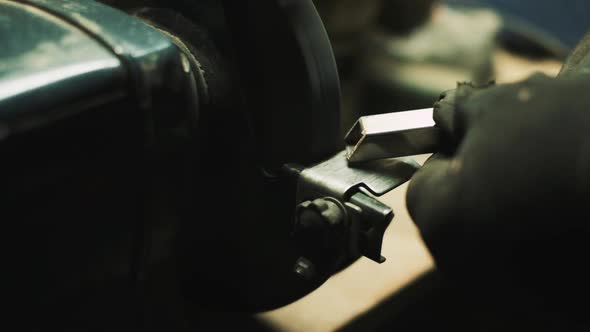 Man Works With Electric Tool.