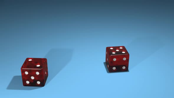 Dice falling on gambling table.