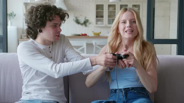 Couple in Relaxing Playing Video Games