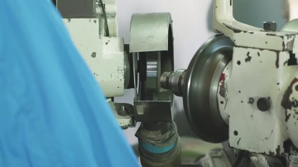 Asian mechanical workers working on milling machine. The man working carefully prevent danger.