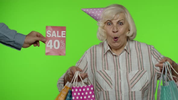 Advertisement Sale 40 Percent Off Appears Next To Grandmother. Woman Celebrating with Shopping Bags