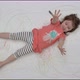 Little Girl Dabbles on Camera on Painted Floor - VideoHive Item for Sale