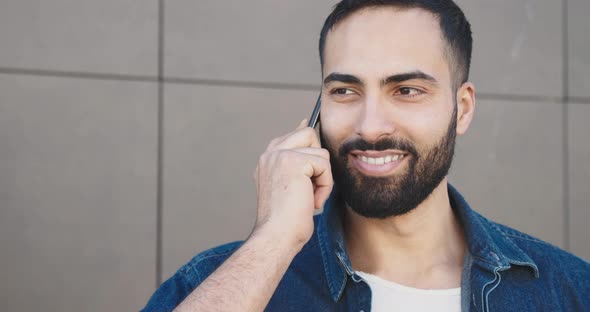 Close Up of Man with Smartphone