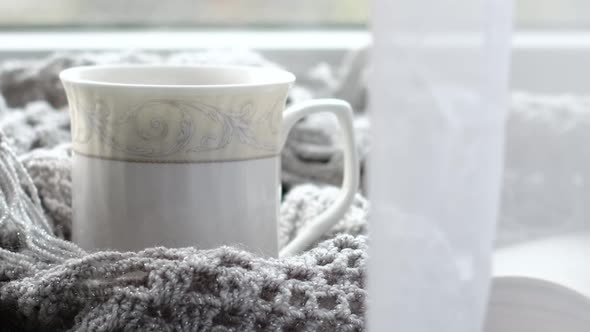 Cozy Home with Cup of Coffee and a Book