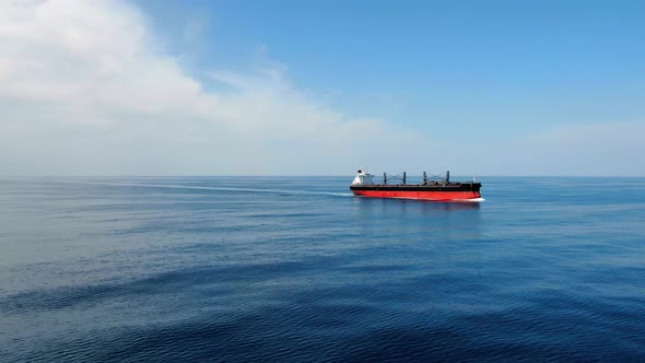 A large ship for transporting bulk cargo across the ocean