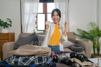 Cheerful woman using mobile phone blank white screen display frameless modern design while pack